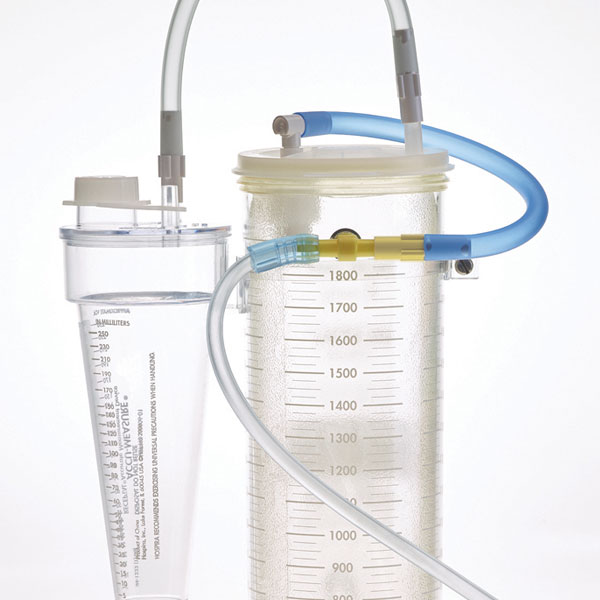 3. Follow RECEPTAL® single liner set-up. Use tandem tubing to connect vacuum port of ACCU-MEASURE® to patient port of liner lid.