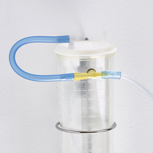 2. Remove patient suction tubing from patient port and discard.