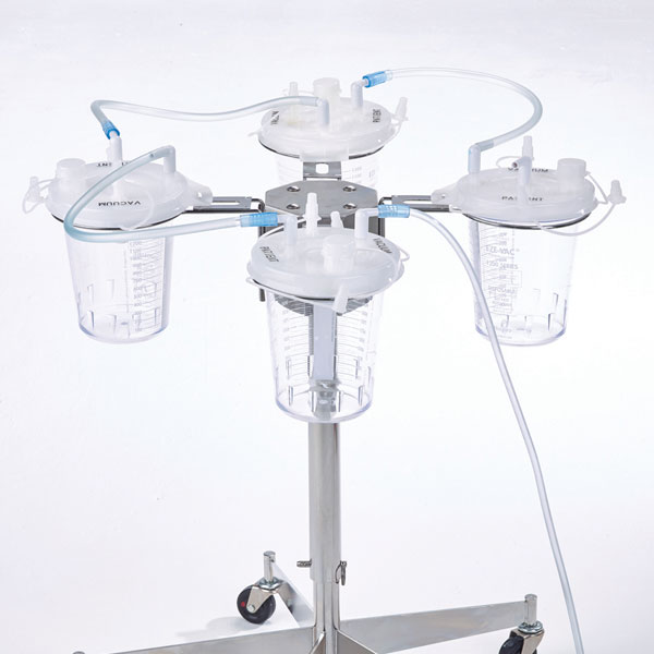 3. Connect ortho port to adjacent patient port with tandem tubing (Item 43317-25). Repeat until all canisters are connected.