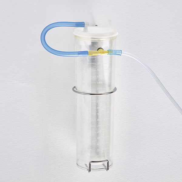 3. Conecte el tubo azul VAC-GARD® de la tapa y el tubo de vacío al recipiente en “T”.